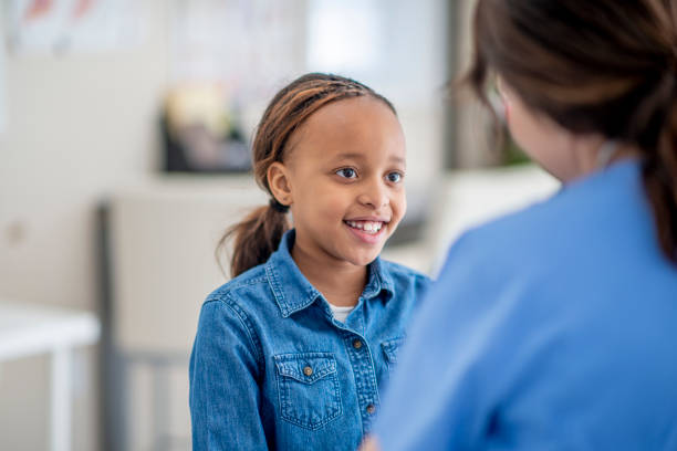 istock Little Girl at the Doctors 1366671006