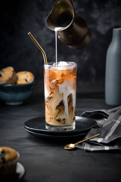 istock Glass with ice and coffee 1366671137