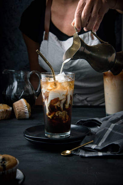 istock Glass with ice and coffee 1366671177