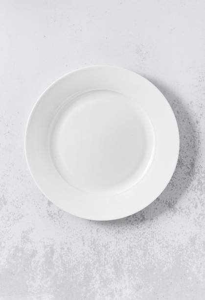 istock empty set of dishes on the table. table setting. kitchen utensils and appliances. 1366671239