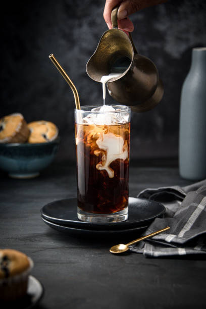 istock Glass with ice and coffee 1366671276
