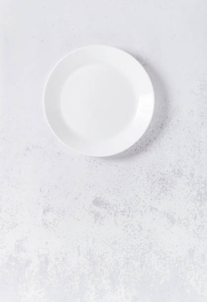 istock empty set of dishes on the table. table setting. kitchen utensils and appliances. 1366671630