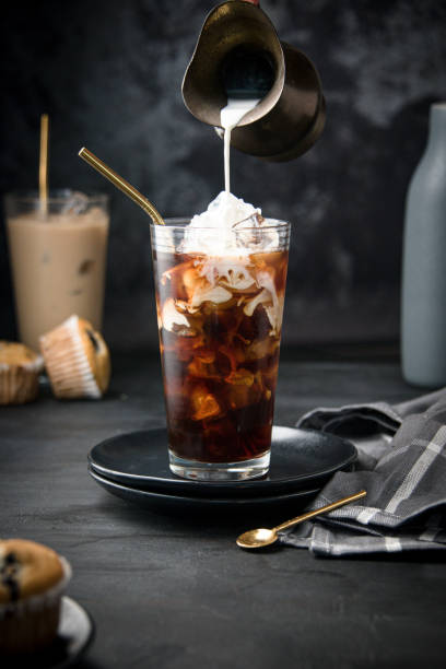 istock Glass with ice and coffee 1366671677