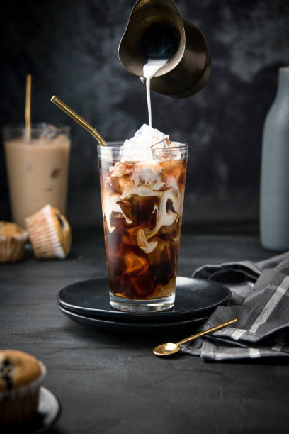 istock Glass with ice and coffee 1366672284