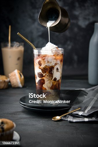istock Glass with ice and coffee 1366672341