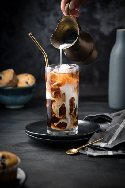istock Glass with ice and coffee 1366672388