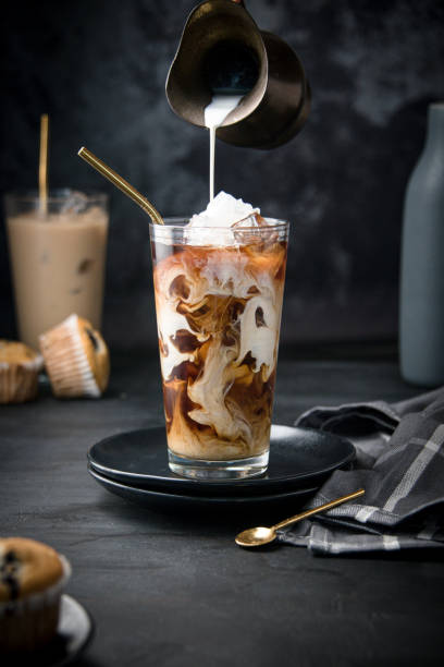 istock Glass with ice and coffee 1366672557