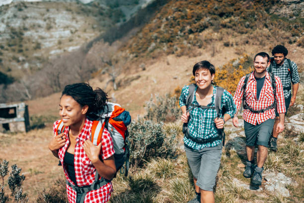 istock friends hiking in the mountains 1366672970