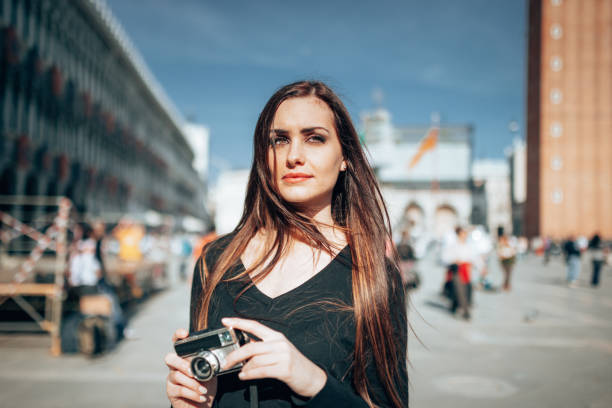 istock tourist in venice in st. mark square 1366673957