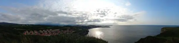 Photo of Panorama of a subset at the coast of Spain