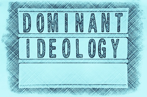 Words 'Dominant Ideology' in a Light Box Trend under Xray for an examining Dictatorship theme.