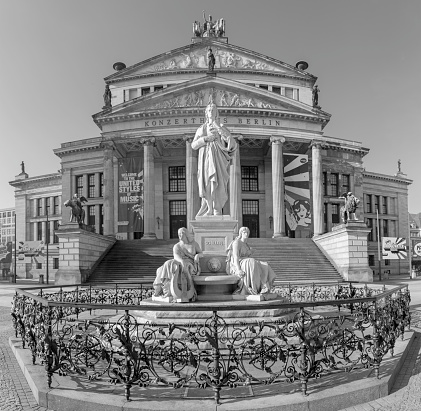 Berlin -  The Konzerthaus building and the memorial of Friedrich Schiller Gendarmenmarkt square.