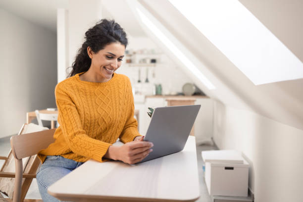 istock Portrait of a young freelancer working from her home office 1366683532