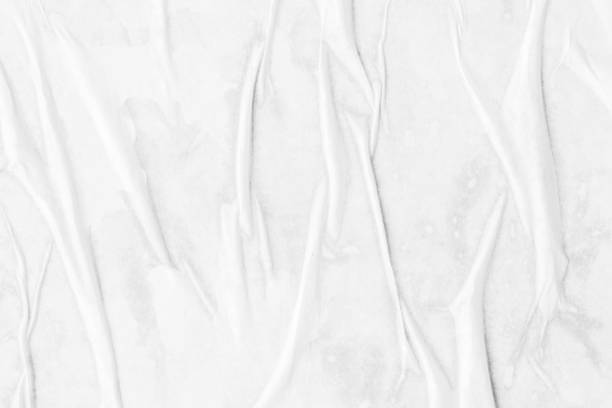 istock white crumpled and creased paper poster texture background 1366685444