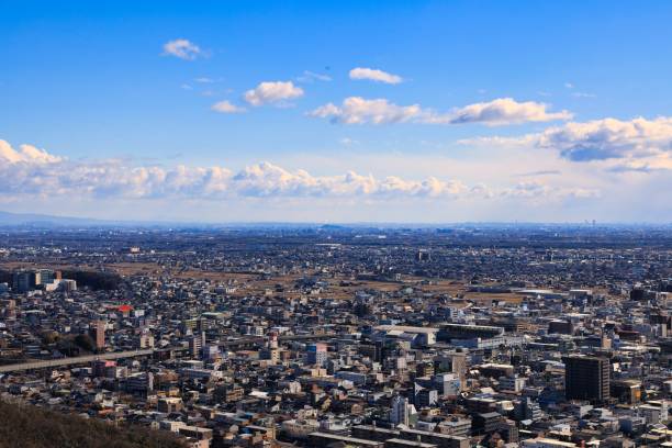 Cityscape seen from a hill in Gifu City, Gifu Prefecture on a sunny day stock photo