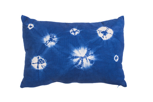 Decorative soft pillow,blue tie dye isolated on white background