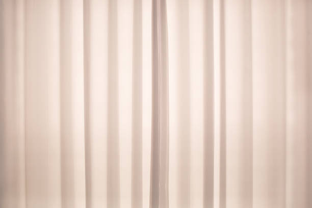 istock white curtain with morning light 1366692670