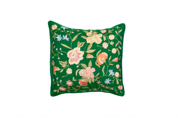 istock green decorative pillow with floral embroidery isolated on white background 1366692682
