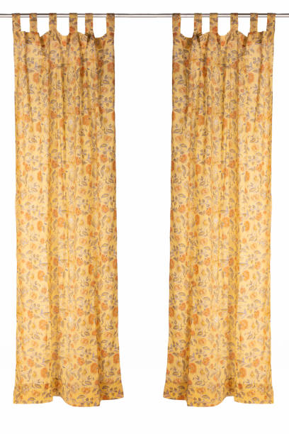 istock yellow curtain with flowers isolated on white background 1366693387