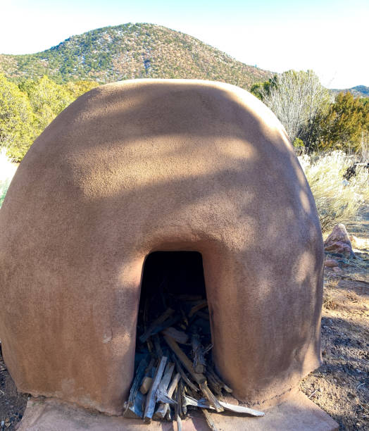 Santa Fe Style: Traditional Adobe Horno Oven (Outdoors) with Wood Santa Fe Style: Traditional Adobe Horno Oven (Outdoors) with Wood stove oven adobe outdoors stock pictures, royalty-free photos & images