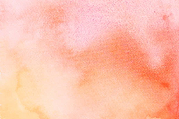 istock Orange and Yellow watercolor flowing background 1366694412