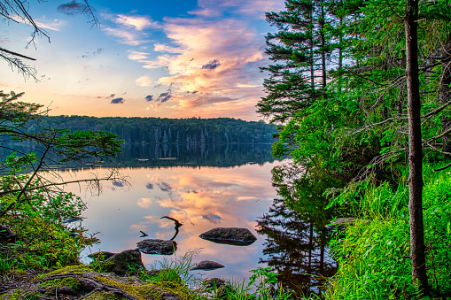 Colorful sunset over a lake in southern Vermont.