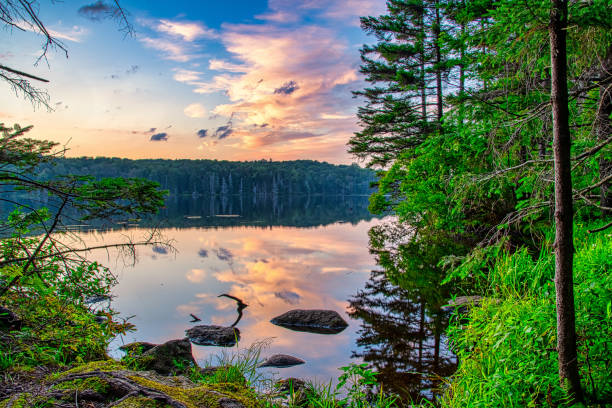 Colorful Sunset On The Lake Colorful sunset over a lake in southern Vermont. green mountains appalachians photos stock pictures, royalty-free photos & images