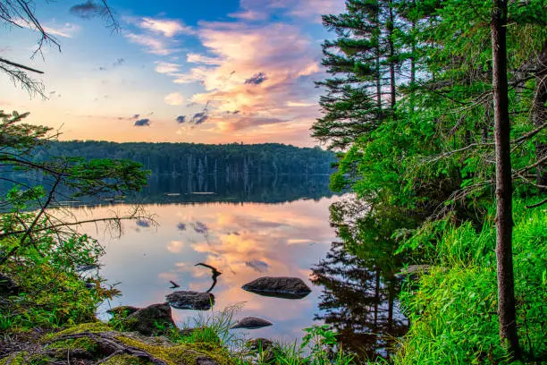 Colorful sunset over a lake in southern Vermont.