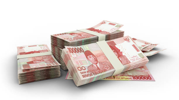 pila 3d di 100000 banconote di rupia indonesiana isolate su sfondo bianco - indonesian currency foto e immagini stock