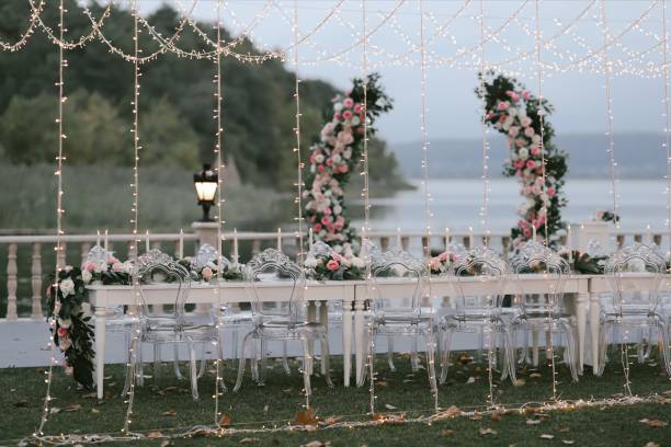 istock Sea view and LED illuminated wedding corner and guest tables 1366701517