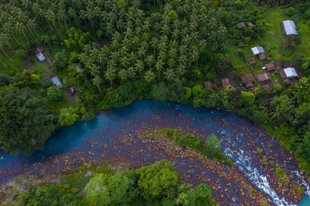 Sinamut River A natural blue-colored river at Kuraio in the Kunua District of Bougainville, Papua New Guinea Papua New Guinea stock pictures, royalty-free photos & images