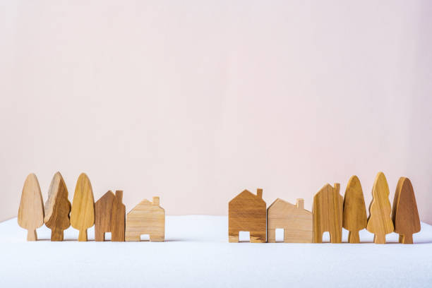 istock group of wood home toy shape on white table peach background 1366705023