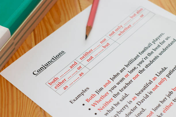 istock English homework and exercise on wooden table 1366705877