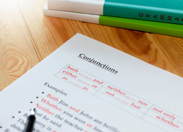 istock English homework and exercise on wooden table 1366705886