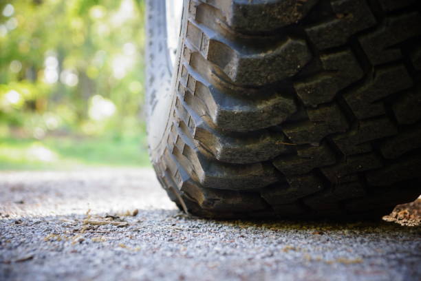 istock Tire on gravel 1366711717