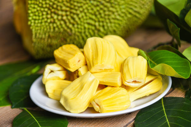 istock jackfruit on white plate with leaf, ripe jackfruit peeled tropical fruit fresh from jackfruit tree 1366714059