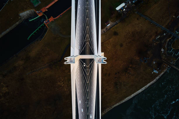 istock Large bridge over river with cars traffic 1366714259