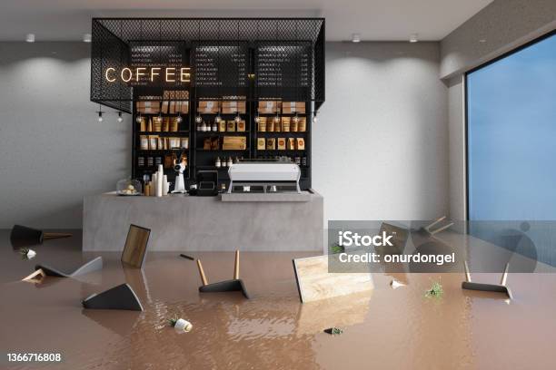 Flooded Cafe With Chairs Tables And Potted Plants Floating On Water Stock Photo - Download Image Now