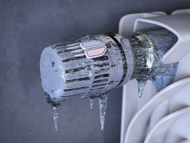 Thermostatic radiator valve with icicles. Energy crisis, sturning off heating for non-payment and saving concept. Thermostatic radiator valve with icicles. Energy crisis, sturning off heating for non-payment and saving concept. 3d illustration fuel crisis stock pictures, royalty-free photos & images