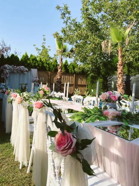 istock tulle and flower chair decoration 1366725145
