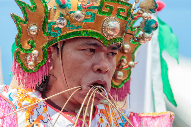 West Kalimantan, Indonesia - February 19, 2019: The Shaman of Singkawang. An Extra ordinary performance and ritual during Chap Go Meh celebration in Singkawang, West Kalimantan province. This celebration is highlighted with the parade of the ancient of Tatung.