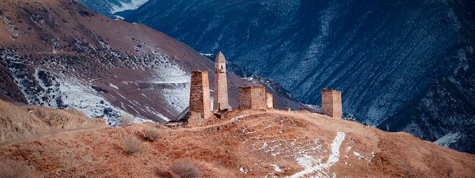 The tower village of Morchi of the 15th - 16th centuries with the ruins of ancient battle towers. Russia, Republic of Ingushetia, Dzheyrakhsky region.