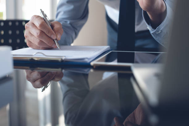istock Businessman working in office, signing business contract 1366733106