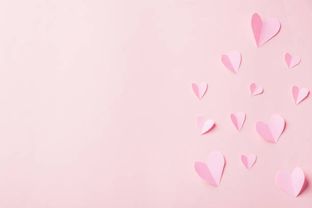 istock Pattern beautiful pink paper hearts cut composition greeting gift card 1366734092