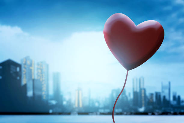 istock Heart hanging with a night scene background 1366736712