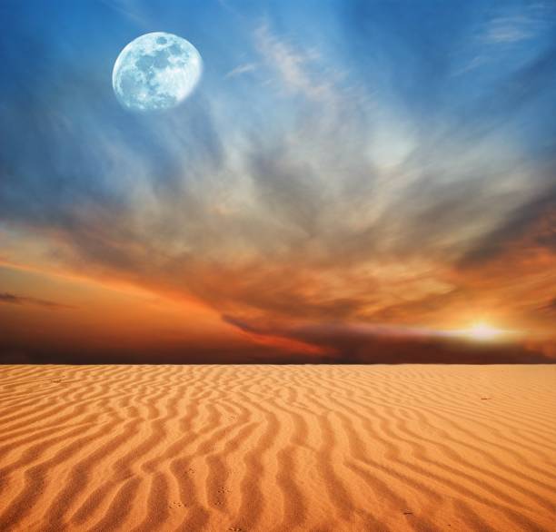 istock magnificent moon above a desert 1366741273