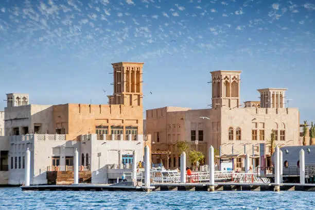 Photo of DUBAI, UAE - December 13: View of traditional arabic buildings at Al Fahidi Historical District, Bastakiya