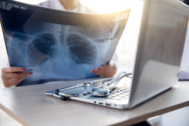 istock Doctor Checking Medical X-ray 1366745510