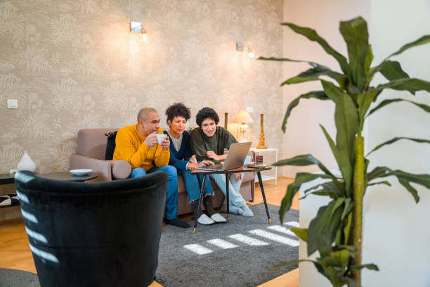 istock Hispanic Woman Using Laptop At Home 1366746051