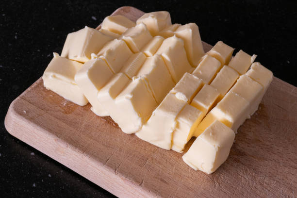 istock Butter sliced in cubes for baking 1366747156